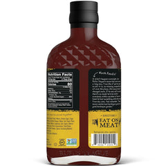 Rufus Teague Honey Sweet BBQ Sauce pour shows smooth pour and sticky glaze