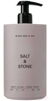 Salt & Stone body lotion bottle with Black Rose & Oud hydrates skin.