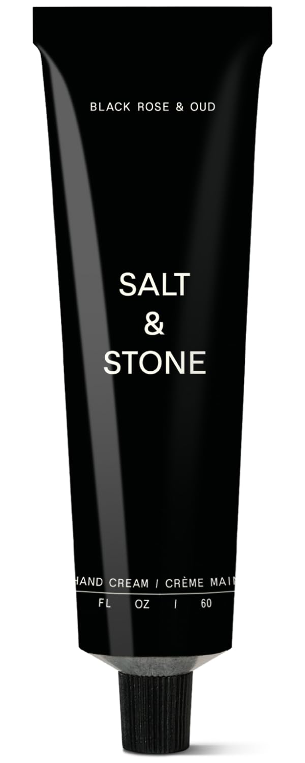 Salt & Stone hand cream bottle with Black Rose and Oud fragrance for daily care.