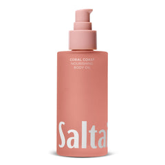Saltair Body Oil bottle featuring Coral Coast scent for silky hydration after shower.