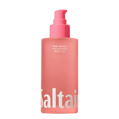 Saltair Body Oil pink beach bottle, tropical scent, gentle hydration.
