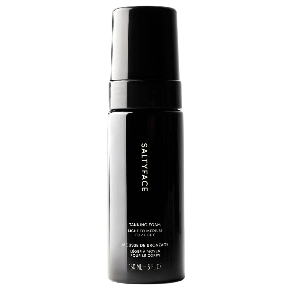 SALTYFACE tanning foam bottle front; vegan self-tanner for an even, natural-looking glow.