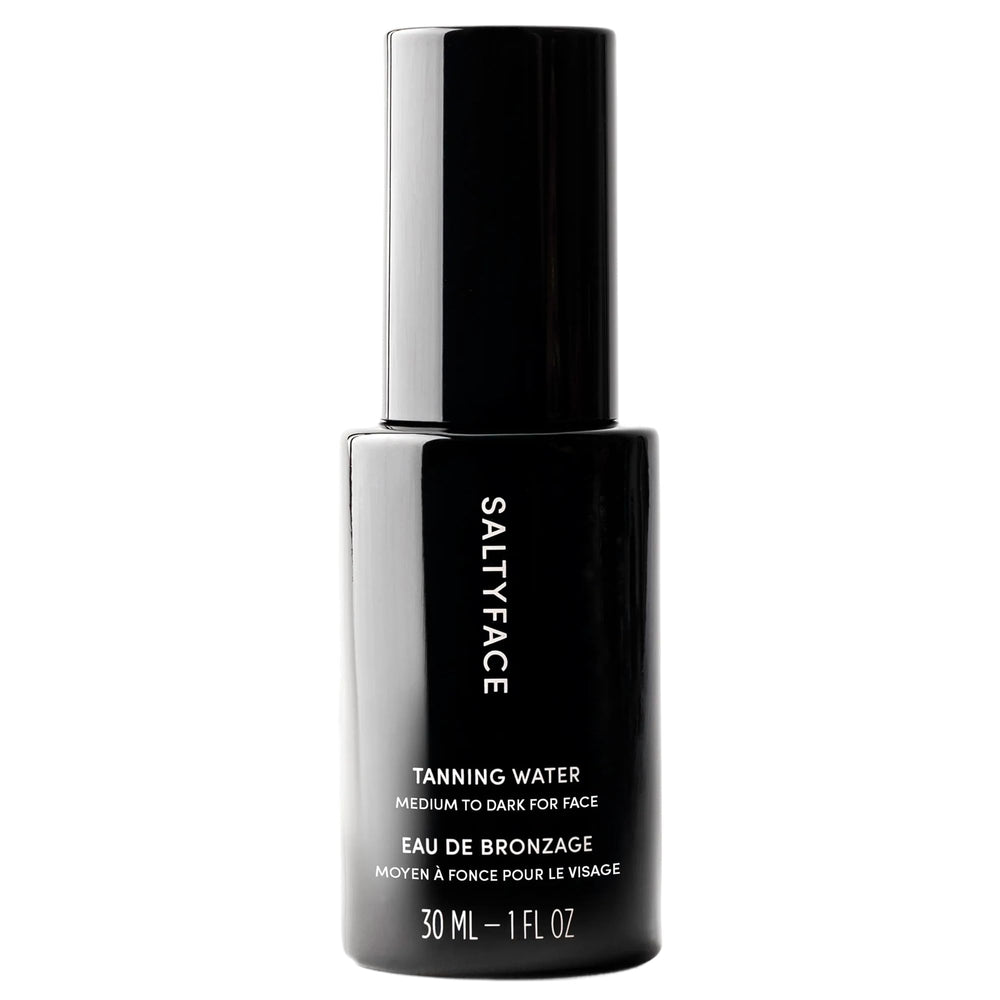 SALTYFACE tanning water on face, neck, and chest for a natural glow.