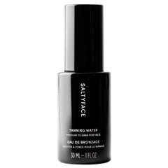SALTYFACE tanning water on face, neck, and chest for a natural glow.