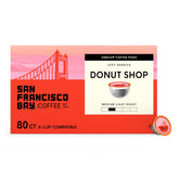 SAN FRANCISCO BAY Donut Shop pods on a breakfast table, ideal for quick mornings.