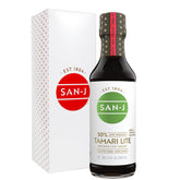 San-J Tamari Lite bottle pours, highlighting a reduced-sodium flavor option.