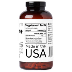 Santa Cruz Paleo Creatine bottle label close-up illustrating pure creatine monohydrate.