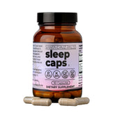 Santa Cruz Paleo Sleep Caps bottle on a nightstand for a calm bedtime routine.