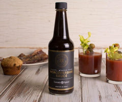 Pouring Savory Spice vegan Worcestershire for sauces and marinades.