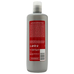 Schwarzkopf Igora Royal 30 vol developer being poured for consistent lift during processing