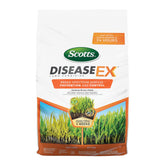 Scotts DiseaseEx lawn fungicide bottle on green lawn for preventive protection.