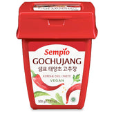 Sempio gochujang mild heat bottle front for versatile spicy-sweet flavor boost.
