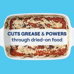 Fragrance-free Seventh Generation dish liquid removing dried-on food residue from dishes.