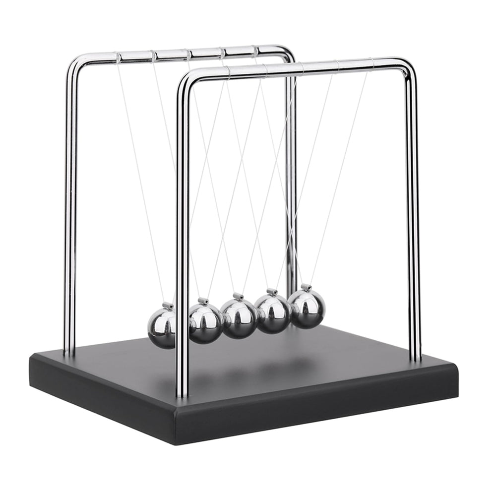 SEVNPRIME 5-bead Newton's cradle on a black base demonstrates momentum transfer on a desk.