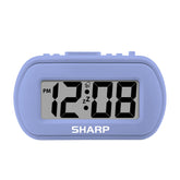 Sharp Digital Alarm Clock with tactile lavender finish provides easy bedside visibility.