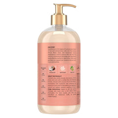 SheaMoisture Coconut Hibiscus Shampoo bottle pour showing rich lather