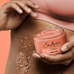 Coconut oil boost in Sheamoisture scrub emphasizes nourishing preparation for radiant skin.