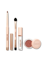 SHEGLAM Lip Dazzler Kit open packaging shows 4-in-1 convenience for on-the-go glam.