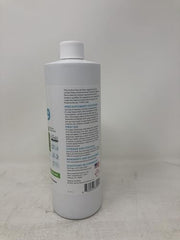 Measuring scoop beside SNS-209 bottle enables precise dilution