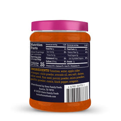 Siete Enchilada Red bottle pour close-up highlighting smooth texture and versatility