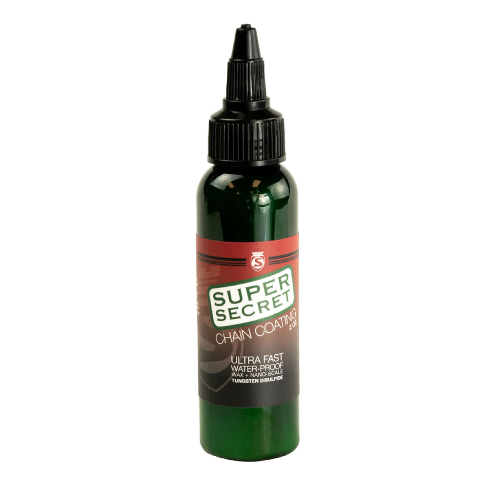 SILCA Super Secret Bike Chain Lube being dripped onto a chain for smooth operation