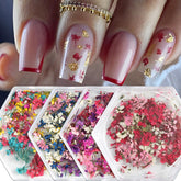 SILPECWEE four-box set of 3D dried flower nail stickers for vibrant DIY manicures.