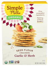 Simple Mills Garlic and Herb Organic Seed Crackers in a box, pantry-friendly gluten-free snack.