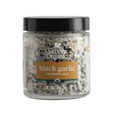 Simply Organic Black Garlic Finishing Salts jar close-up enhancing grilled meat with savory depth
