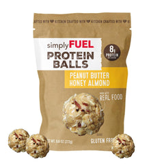SimplyFUEL Protein Balls close-up showing peanut butter honey almond flavor.