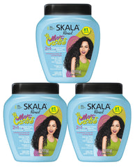 SKALA Curls Hydrates bottle poured, showcasing 2-in-1 conditioning for soft, defined curls