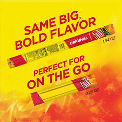 Slim Jim Smoked Meat Sticks stick-closeup highlights juicy beef, pork and chicken blend.