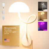 Smallish Shroommate clip-on light mounted on bed rail for bedside illumination