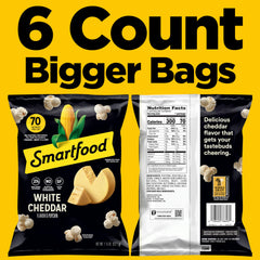 Smartfood White Cheddar bag close-up, real cheese flavor highlighted.