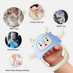 Smily Mia teething-brush function in ocean blue aiding gentle gum massage.