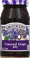Smucker's Concord Grape Jelly spread on toast for breakfast.