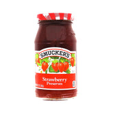 Smucker's Strawberry Preserves jar ready for toast