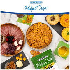 Snack Factory Garlic Parmesan Pretzel Crisps topped with tomato, basil, and mozzarella for an easy snack.