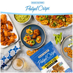 Bruschetta topping idea using pretzel crisps on a board.