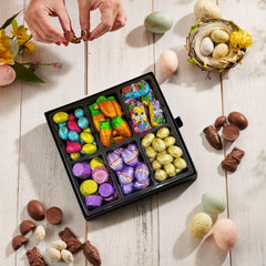 Snackberry Easter platter showcases chocolate carrots for playful seasonal snacking.