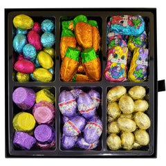 Snackberry Easter platter with gold foiled eggs for festive, luxe chocolate gifts.