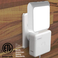 Solatec auto-sensor night light demonstrates dusk-to-dawn activation in a dim corridor