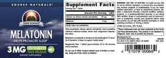 Source Naturals Time Released Melatonin bottle nightstand suggests easy nightly routine.