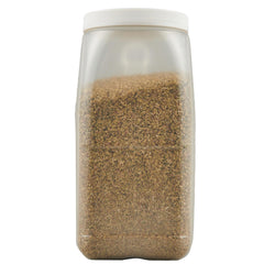Closeup of dried oregano leaves from Spice Classics, releasing a robust aroma as they cook.