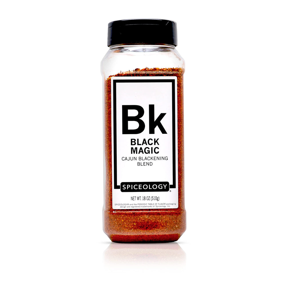 Spiceology Black Magic bottle pour showing bold Cajun aroma for flavorful weeknights