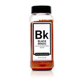 Spiceology Black Magic bottle pour showing bold Cajun aroma for flavorful weeknights