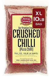 Spicy World crushed red pepper flakes 10lb bulk pack in a clear bag for bold flavor