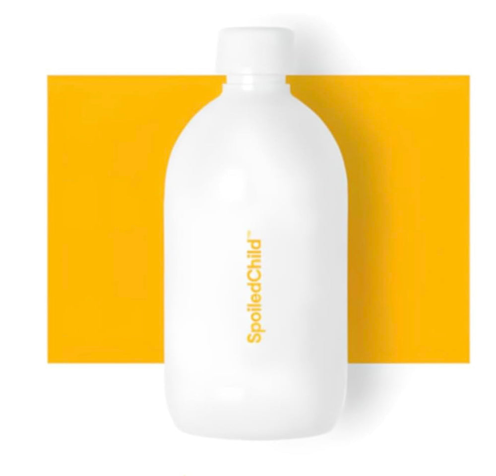 SpoiledChild collagen pineapple bottle pour for daily beauty support.