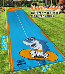 Spring Water slip-and-water-slide setup in progress shows easy water-pipe connection.