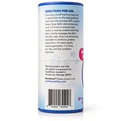 Squishface Nose Balm being applied to a dog's nose for gentle hydration.