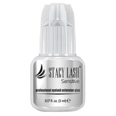 STACY LASH Sensitive glue bottle closeup for professional adhesion.